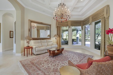 CUSTOM BUILT POOL HOME WITH GOLF & WATER VIEWS in the on The Legacy Golf and Tennis Club in Florida - for sale on GolfHomes.com, golf home, golf lot