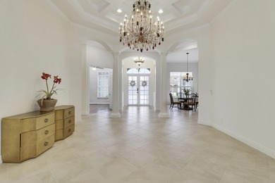 CUSTOM BUILT POOL HOME WITH GOLF & WATER VIEWS in the on The Legacy Golf and Tennis Club in Florida - for sale on GolfHomes.com, golf home, golf lot