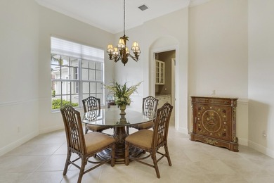 CUSTOM BUILT POOL HOME WITH GOLF & WATER VIEWS in the on The Legacy Golf and Tennis Club in Florida - for sale on GolfHomes.com, golf home, golf lot