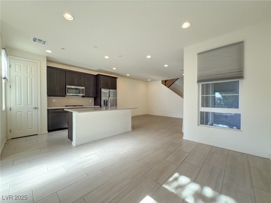 Discover elevated living in this stunning townhome nestled in on Reflection Bay Golf Club in Nevada - for sale on GolfHomes.com, golf home, golf lot