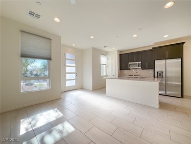 Discover elevated living in this stunning townhome nestled in on Reflection Bay Golf Club in Nevada - for sale on GolfHomes.com, golf home, golf lot