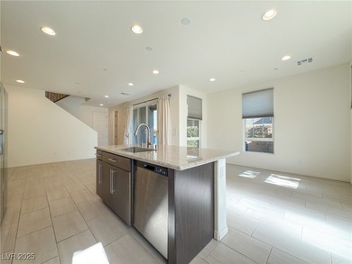 Discover elevated living in this stunning townhome nestled in on Reflection Bay Golf Club in Nevada - for sale on GolfHomes.com, golf home, golf lot