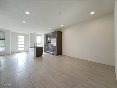 Discover elevated living in this stunning townhome nestled in on Reflection Bay Golf Club in Nevada - for sale on GolfHomes.com, golf home, golf lot