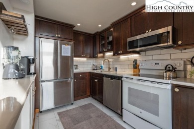 UPDATED mountain condo with sunset and long-range views! This on Beech Mountain Club in North Carolina - for sale on GolfHomes.com, golf home, golf lot