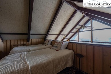 UPDATED mountain condo with sunset and long-range views! This on Beech Mountain Club in North Carolina - for sale on GolfHomes.com, golf home, golf lot