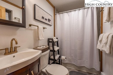 UPDATED mountain condo with sunset and long-range views! This on Beech Mountain Club in North Carolina - for sale on GolfHomes.com, golf home, golf lot