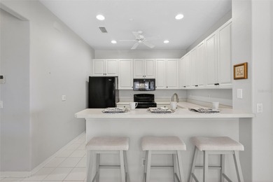 Lovely 2BD/2BA END UNIT villa located in The Links at Pelican on Pelican Pointe Golf and Country Club in Florida - for sale on GolfHomes.com, golf home, golf lot