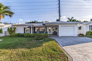 Pompano Beach Single Family Upgraded Home with a 1 car garage on Leisureville Community Association in Florida - for sale on GolfHomes.com, golf home, golf lot