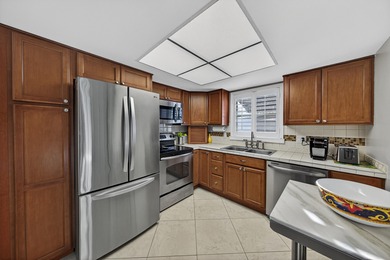 Pompano Beach Single Family Upgraded Home with a 1 car garage on Leisureville Community Association in Florida - for sale on GolfHomes.com, golf home, golf lot