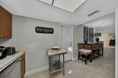 Pompano Beach Single Family Upgraded Home with a 1 car garage on Leisureville Community Association in Florida - for sale on GolfHomes.com, golf home, golf lot