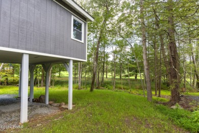 Welcome to your dream home on the 9th hole of a picturesque golf on The Hideout Golf in Pennsylvania - for sale on GolfHomes.com, golf home, golf lot