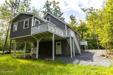 Welcome to your dream home on the 9th hole of a picturesque golf on The Hideout Golf in Pennsylvania - for sale on GolfHomes.com, golf home, golf lot