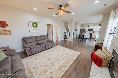 Welcome to this beautifully updated 6-bedroom, 2.5-bath home on Eagle Creek Golf Club and Grill in North Carolina - for sale on GolfHomes.com, golf home, golf lot