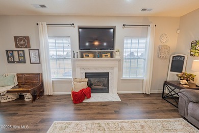 Welcome to this beautifully updated 6-bedroom, 2.5-bath home on Eagle Creek Golf Club and Grill in North Carolina - for sale on GolfHomes.com, golf home, golf lot