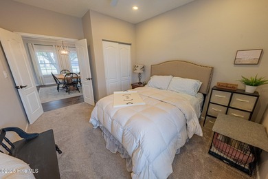 Welcome to this beautifully updated 6-bedroom, 2.5-bath home on Eagle Creek Golf Club and Grill in North Carolina - for sale on GolfHomes.com, golf home, golf lot