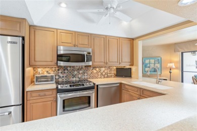 Under contract-accepting backup offers. NEW METAL ROOF FALL on Twin Isles Country Club in Florida - for sale on GolfHomes.com, golf home, golf lot