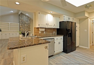 Golf-front living at its finest! This beautiful single-story on Woodlake Country Club in North Carolina - for sale on GolfHomes.com, golf home, golf lot