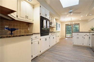 Golf-front living at its finest! This beautiful single-story on Woodlake Country Club in North Carolina - for sale on GolfHomes.com, golf home, golf lot