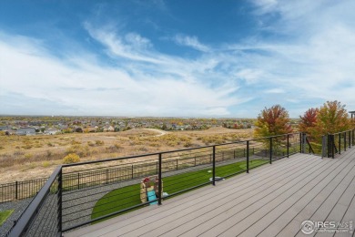 Welcome to this custom-built masterpiece overlooking panoramic on Pelican Lakes Golf and Country Club in Colorado - for sale on GolfHomes.com, golf home, golf lot