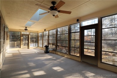 Golf-front living at its finest! This beautiful single-story on Woodlake Country Club in North Carolina - for sale on GolfHomes.com, golf home, golf lot