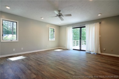 Golf-front living at its finest! This beautiful single-story on Woodlake Country Club in North Carolina - for sale on GolfHomes.com, golf home, golf lot