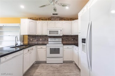 Located in the highly desirable 55+ gated community of Sabal on Sabal Springs Golf and Racquet Club in Florida - for sale on GolfHomes.com, golf home, golf lot