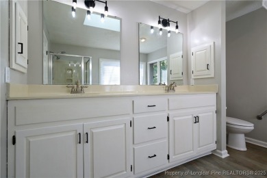 Golf-front living at its finest! This beautiful single-story on Woodlake Country Club in North Carolina - for sale on GolfHomes.com, golf home, golf lot