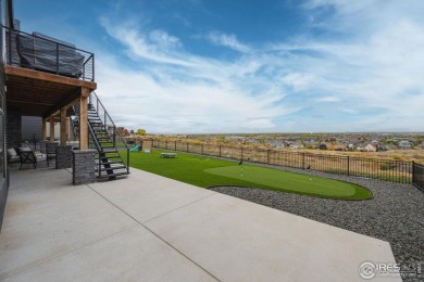 Welcome to this custom-built masterpiece overlooking panoramic on Pelican Lakes Golf and Country Club in Colorado - for sale on GolfHomes.com, golf home, golf lot