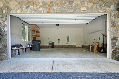 Golf-front living at its finest! This beautiful single-story on Woodlake Country Club in North Carolina - for sale on GolfHomes.com, golf home, golf lot