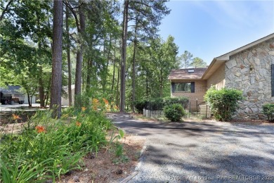 Golf-front living at its finest! This beautiful single-story on Woodlake Country Club in North Carolina - for sale on GolfHomes.com, golf home, golf lot