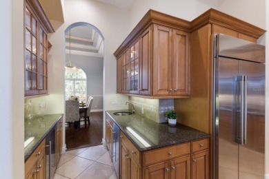 Nestled at the end of a tranquil cul-de-sac in the coveted on Lakewood Ranch Golf and Country Club in Florida - for sale on GolfHomes.com, golf home, golf lot