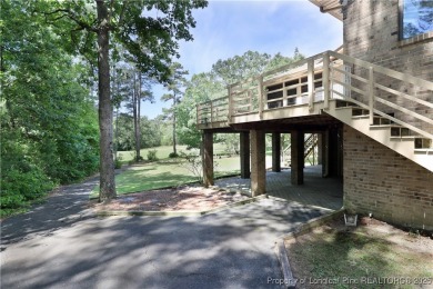 Golf-front living at its finest! This beautiful single-story on Woodlake Country Club in North Carolina - for sale on GolfHomes.com, golf home, golf lot