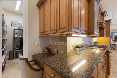 Nestled at the end of a tranquil cul-de-sac in the coveted on Lakewood Ranch Golf and Country Club in Florida - for sale on GolfHomes.com, golf home, golf lot