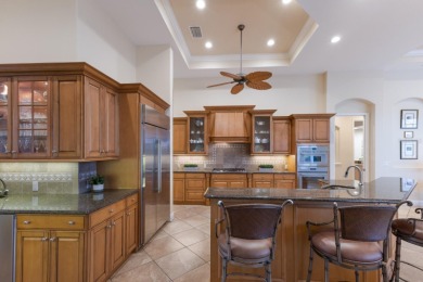 Nestled at the end of a tranquil cul-de-sac in the coveted on Lakewood Ranch Golf and Country Club in Florida - for sale on GolfHomes.com, golf home, golf lot