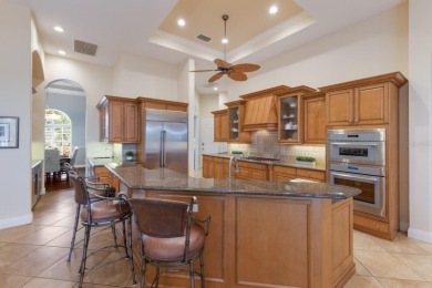 Nestled at the end of a tranquil cul-de-sac in the coveted on Lakewood Ranch Golf and Country Club in Florida - for sale on GolfHomes.com, golf home, golf lot