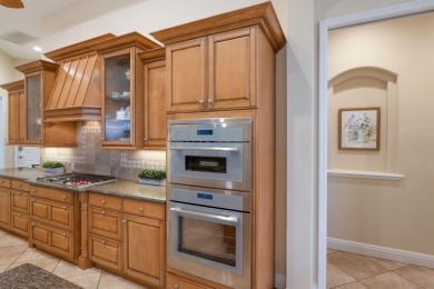 Nestled at the end of a tranquil cul-de-sac in the coveted on Lakewood Ranch Golf and Country Club in Florida - for sale on GolfHomes.com, golf home, golf lot