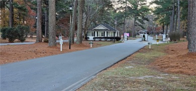 Golf-front living at its finest! This beautiful single-story on Woodlake Country Club in North Carolina - for sale on GolfHomes.com, golf home, golf lot