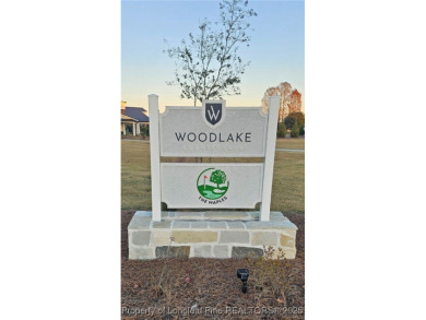 Golf-front living at its finest! This beautiful single-story on Woodlake Country Club in North Carolina - for sale on GolfHomes.com, golf home, golf lot