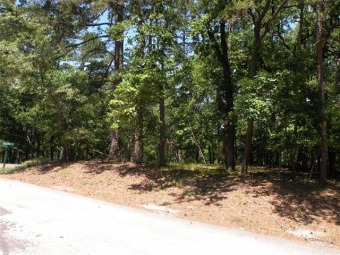 Wonderful corner lot to build a house or weekend home. The lot on Holly Lake Ranch Golf Club in Texas - for sale on GolfHomes.com, golf home, golf lot