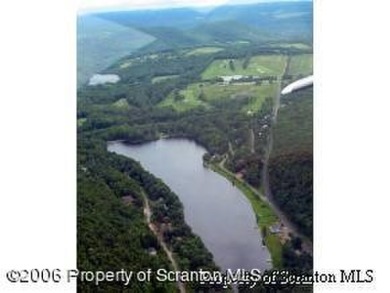 NICE BUILDING LOT WITH VIEWS OF SADDLE LAKE. ALL AMENITIES on Stone Hedge Golf Course in Pennsylvania - for sale on GolfHomes.com, golf home, golf lot