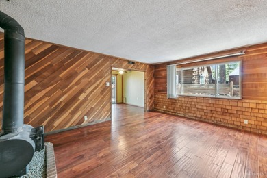 Welcome to your charming single-level Tudor-style cabin located on Bijou Golf Course in California - for sale on GolfHomes.com, golf home, golf lot