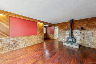 Welcome to your charming single-level Tudor-style cabin located on Bijou Golf Course in California - for sale on GolfHomes.com, golf home, golf lot