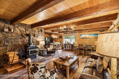 Pine trees, Mountains, Custom log home. True Wyo setting. 2 Wood on Star Valley RV Golf Course in Wyoming - for sale on GolfHomes.com, golf home, golf lot