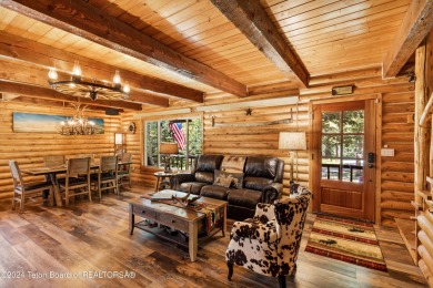 Pine trees, Mountains, Custom log home. True Wyo setting. 2 Wood on Star Valley RV Golf Course in Wyoming - for sale on GolfHomes.com, golf home, golf lot