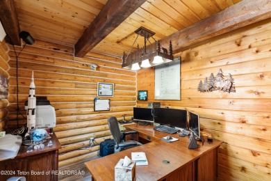 Pine trees, Mountains, Custom log home. True Wyo setting. 2 Wood on Star Valley RV Golf Course in Wyoming - for sale on GolfHomes.com, golf home, golf lot