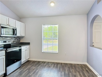 Discover the perfect blend of modern updates and move-in-ready on Citrus Springs Country Club in Florida - for sale on GolfHomes.com, golf home, golf lot