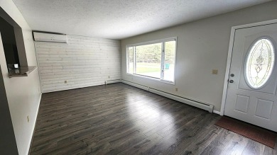 Charming ranch style home situated on the 15th hole of White on White Deer Country Club in Michigan - for sale on GolfHomes.com, golf home, golf lot