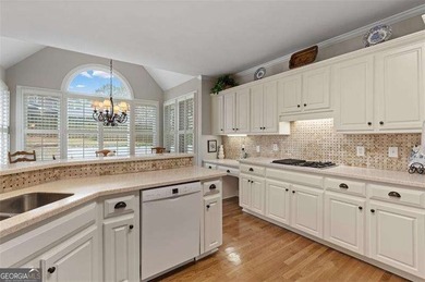 Welcome to 5619 Forkwood Dr- a beautiful and rare ranch home in on Brookstone Golf and Country Club in Georgia - for sale on GolfHomes.com, golf home, golf lot