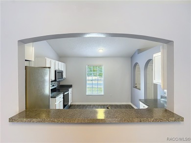 Discover the perfect blend of modern updates and move-in-ready on Citrus Springs Country Club in Florida - for sale on GolfHomes.com, golf home, golf lot