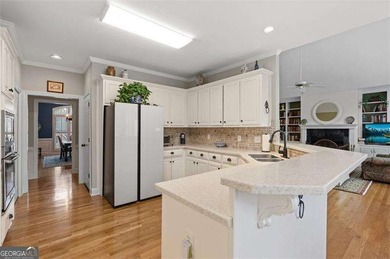 Welcome to 5619 Forkwood Dr- a beautiful and rare ranch home in on Brookstone Golf and Country Club in Georgia - for sale on GolfHomes.com, golf home, golf lot